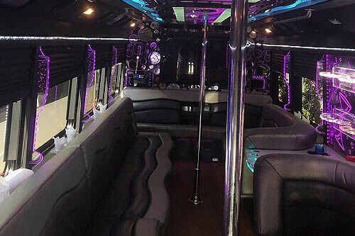 Party bus with built-in dance poles